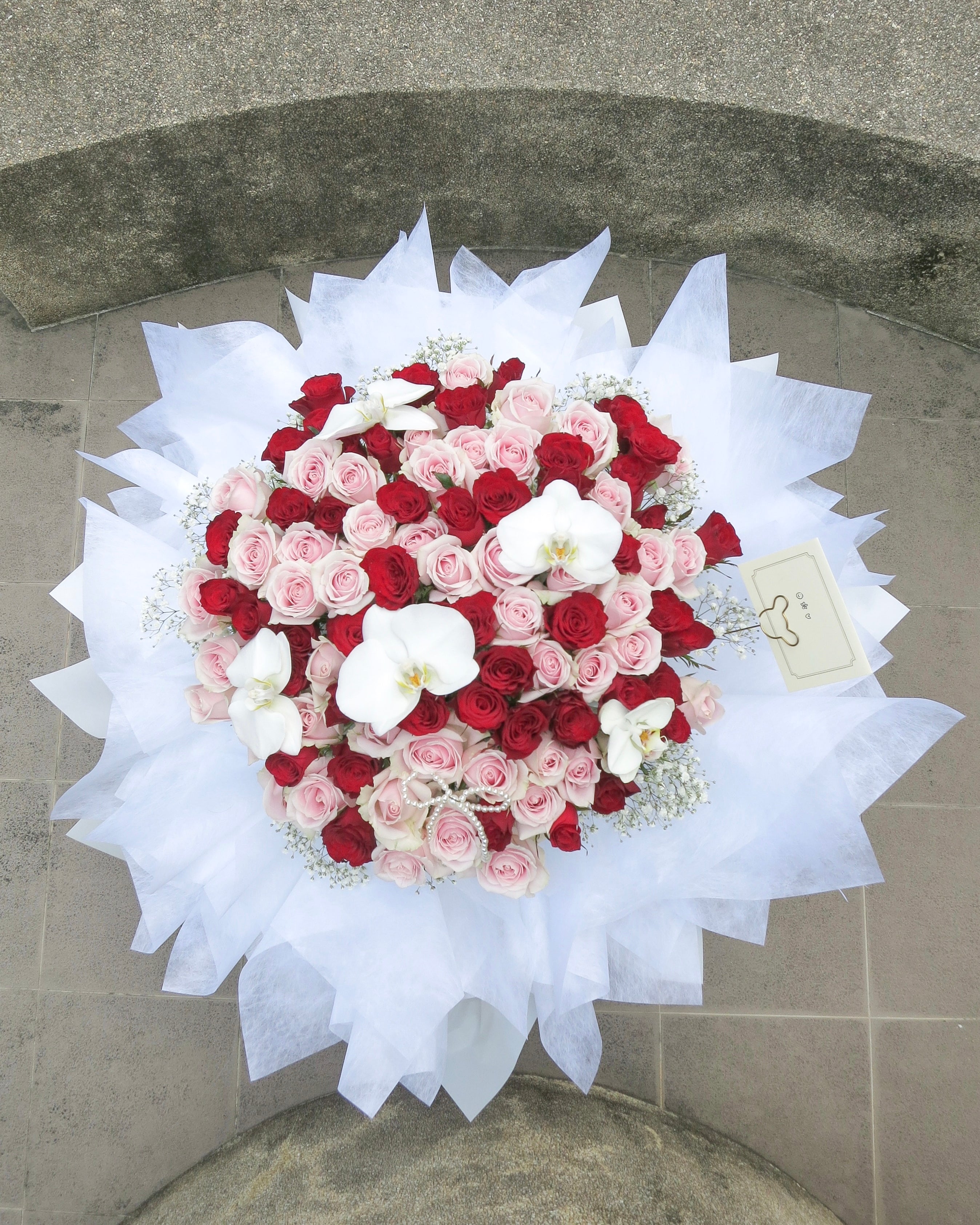 99 Roses with Phalaenopsis