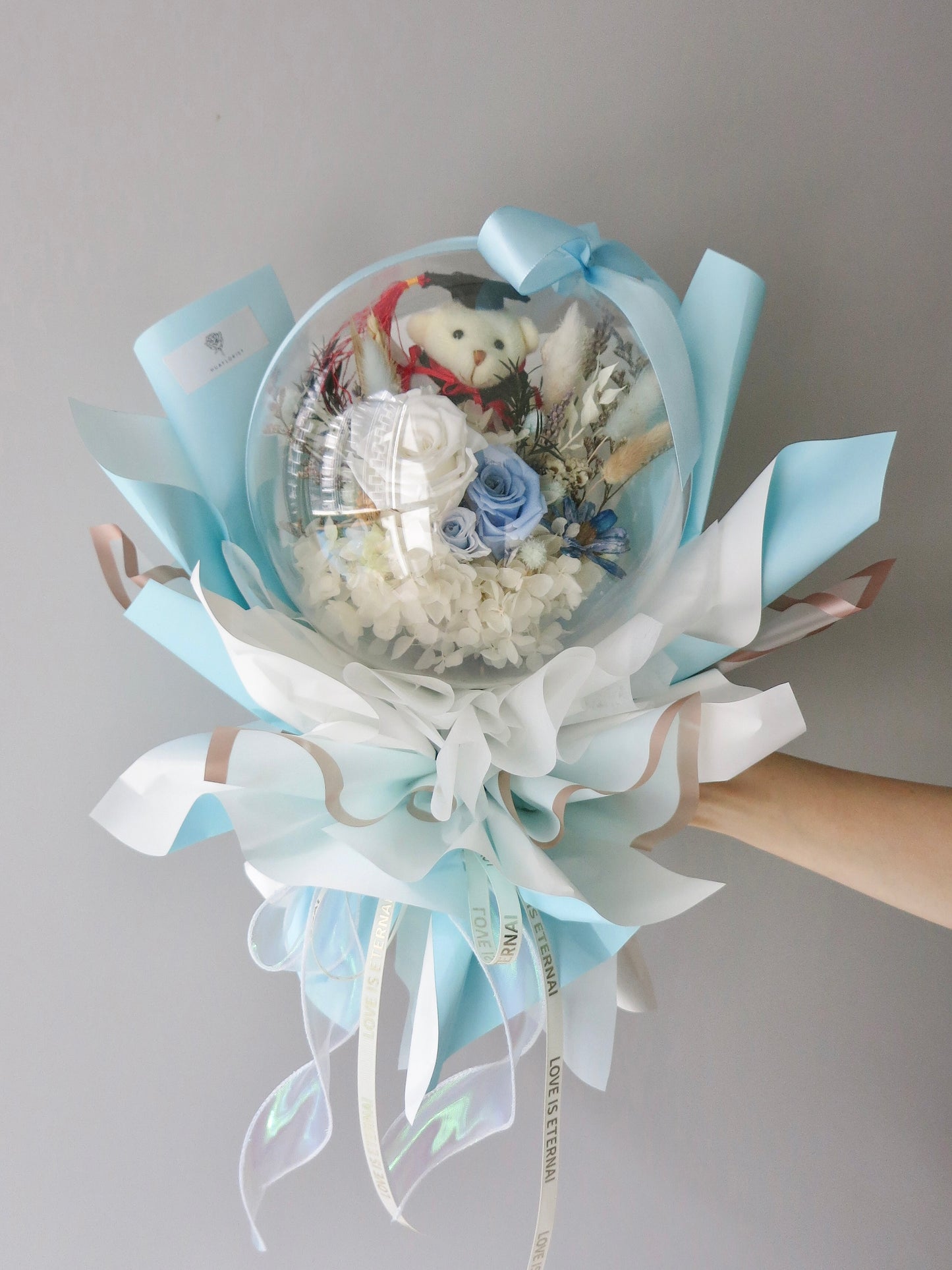Preserved Graduation Blue Bouquet in Acrylic Ball